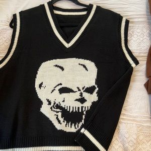 Sweater vest reminds me of the neighbourhood